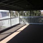 View of spacious deck off dining room
